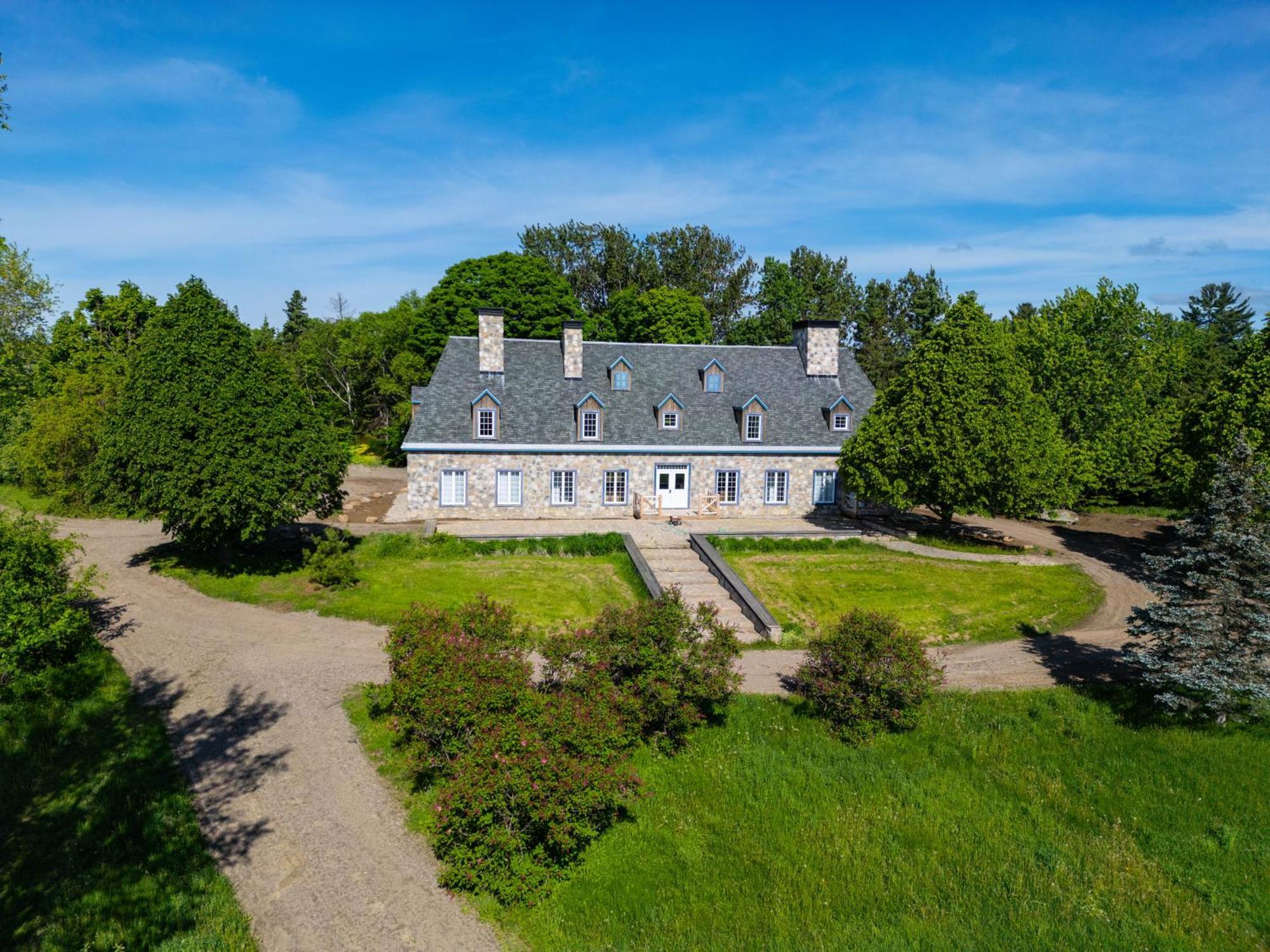 Le Baluchon Eco-Villegiature Saint-Paulin ภายนอก รูปภาพ